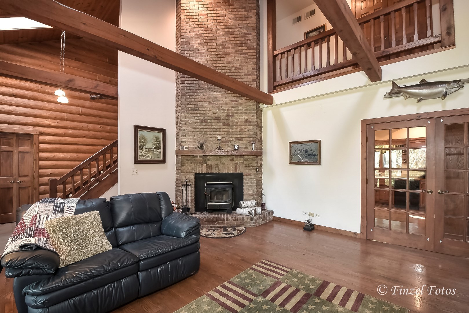 20619 Dunham Road Marengo, IL 60152 - Photo 12 of 31 a living room with furniture a fireplace and a table