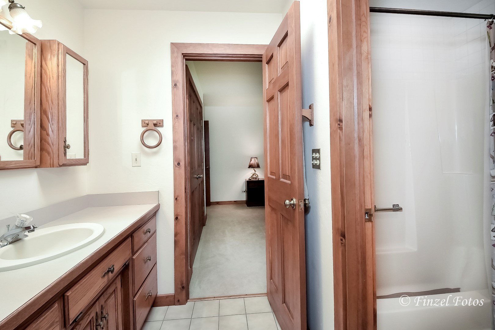 20619 Dunham Road Marengo, IL 60152 - Photo 15 of 31 a bathroom with a sink and a mirror