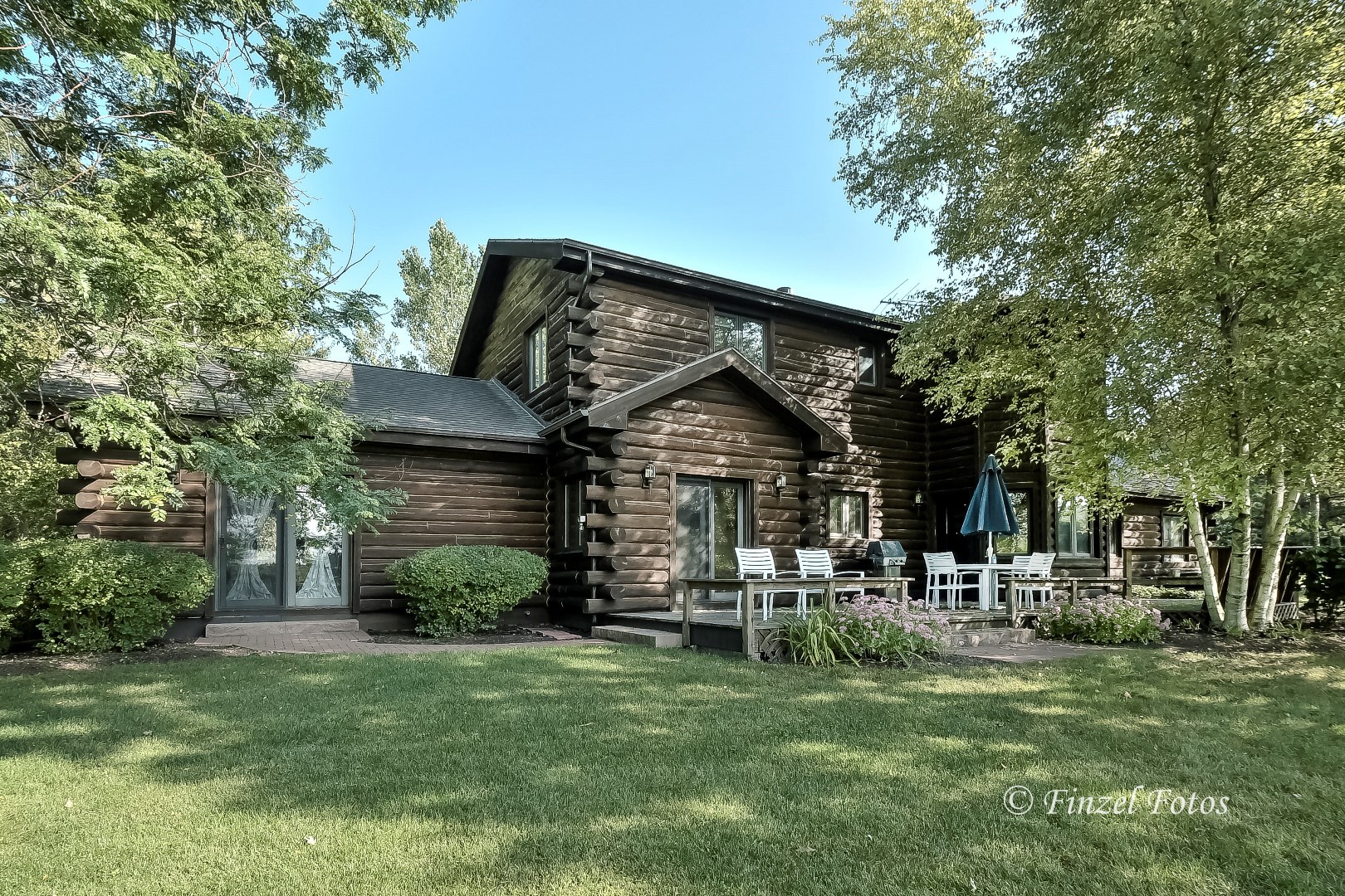 20619 Dunham Road Marengo, IL 60152 - Photo 3 of 31 a front view of a house with a garden