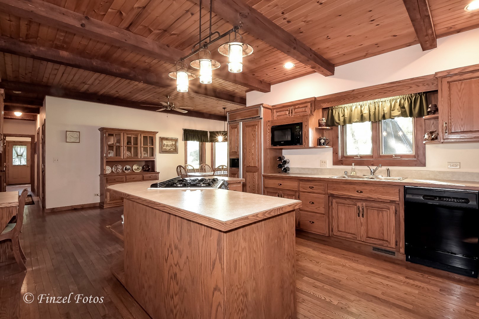 20619 Dunham Road Marengo, IL 60152 - Photo 5 of 31 a large kitchen with stainless steel appliances granite countertop a sink dishwasher a stove and a refrigerator