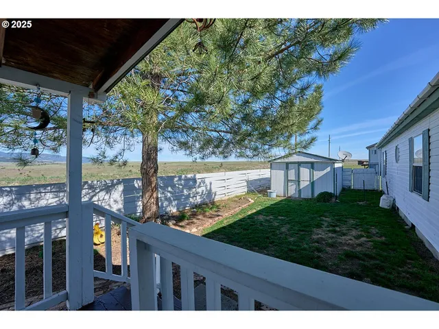 a view of a porch with a yard