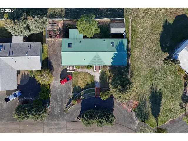 an aerial view of houses and roads