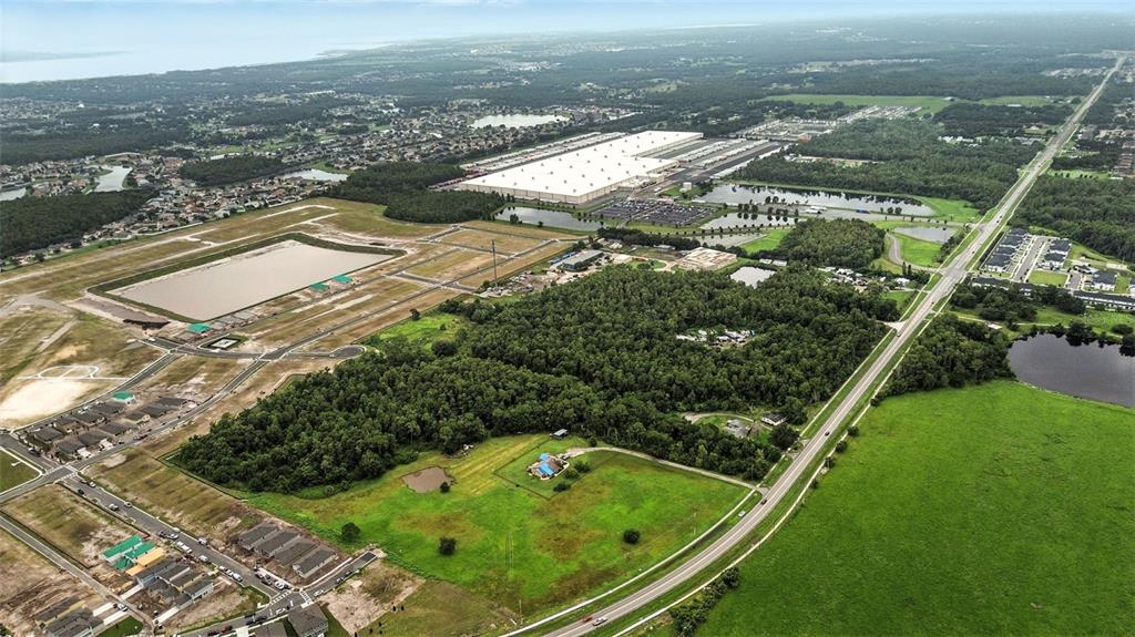 2481 Ham Brown Road Kissimmee, FL 34746 - Photo 15 of 28 an aerial view of residential houses with outdoor space