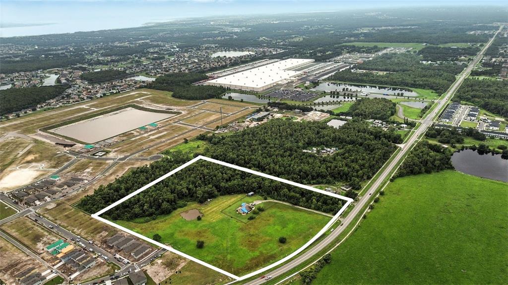 2481 Ham Brown Road Kissimmee, FL 34746 - Photo 16 of 28 an aerial view of a pool