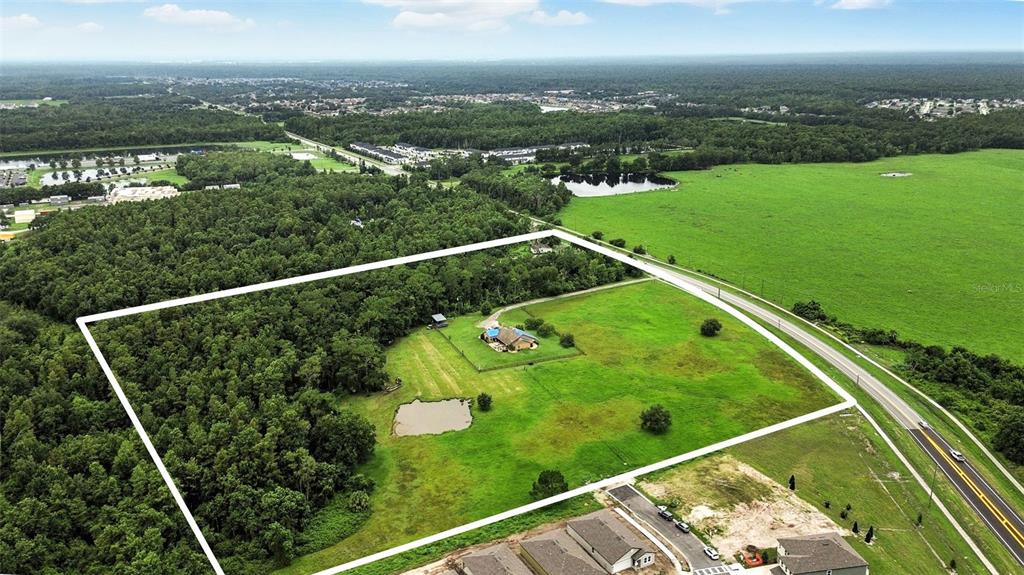 2481 Ham Brown Road Kissimmee, FL 34746 - Photo 20 of 28 a view of a city from a balcony