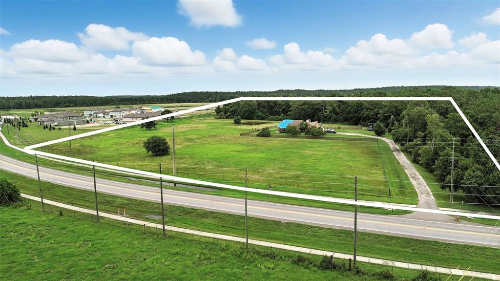 2481 Ham Brown Road Kissimmee, FL 34746 - Photo 6 of 28 a view of a garden