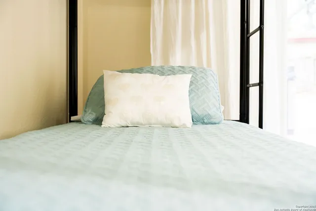 a view of a backyard with a small cabin