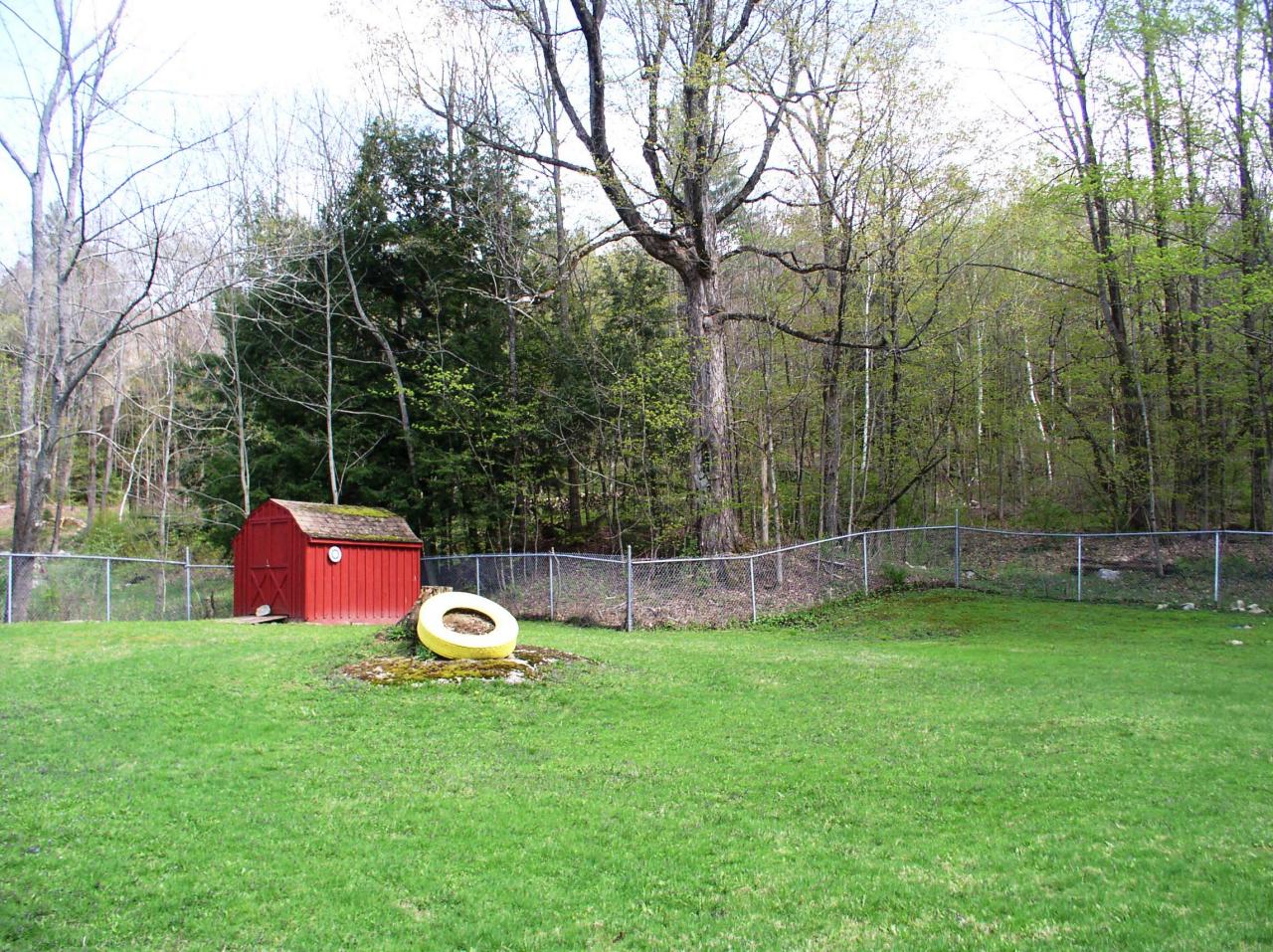 410 River Road Clarksburg, MA 01247 - Photo 3 of 15 Rugged Chain Link Fenced Yard