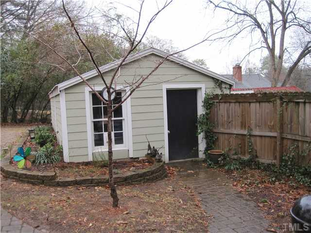 407 Glascock Street Raleigh, NC 27604 - Photo 23 of 25 Workshop on this end, one car garage on the other. Workshop