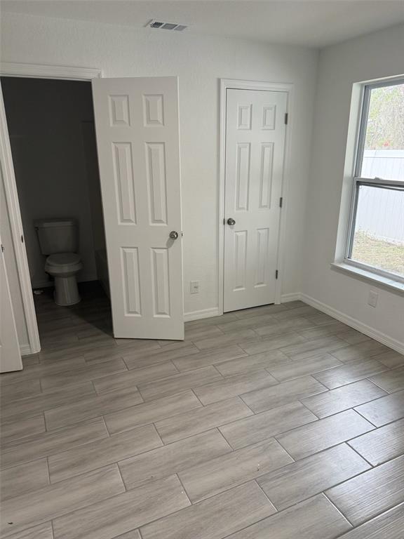 89 West Imogene Street Arcadia, FL 34266 - Photo 14 of 18 a view of an empty room with a window