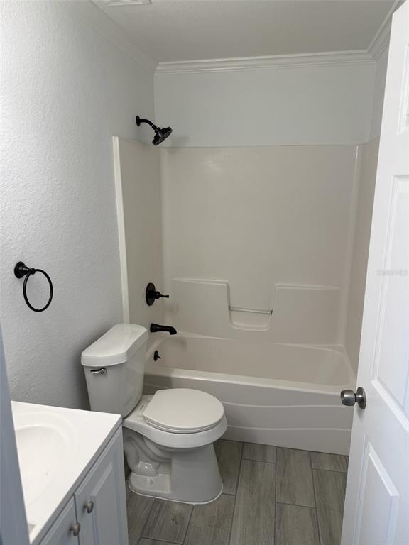 89 West Imogene Street Arcadia, FL 34266 - Photo 8 of 18 a bathroom with a toilet a sink and shower