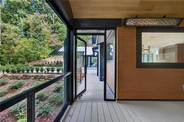 a kitchen with stainless steel appliances a sink stove and cabinets