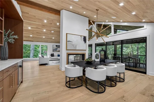a kitchen with lots of counter top space and wooden floor