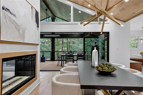 a bedroom with a bed and lamp on desk