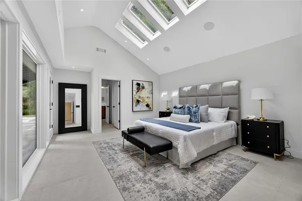 a group of people sitting in front of retail shop