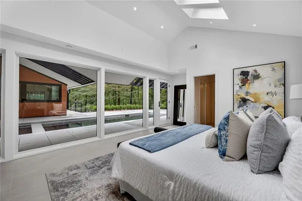 a living room with furniture and a rug