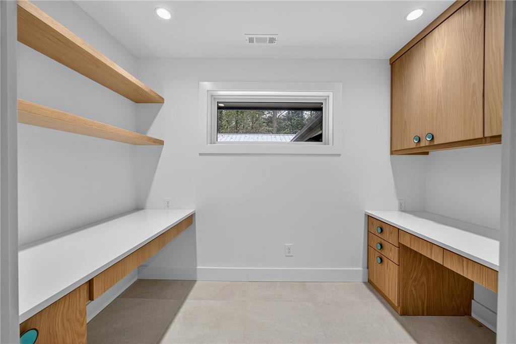 585 Amberidge Trail Northwest Atlanta, GA 30328 - Photo 67 of 103 a view of room with window and wooden floor
