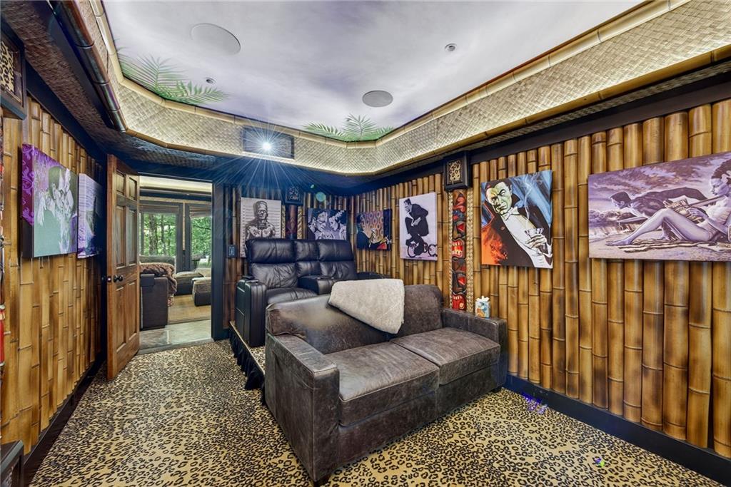 585 Amberidge Trail Northwest Atlanta, GA 30328 - Photo 75 of 103 a living room with furniture and a rug