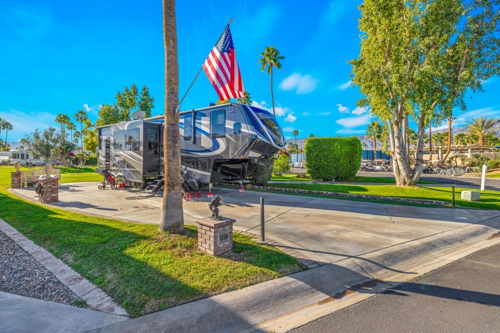 a view of a park with swings and slides
