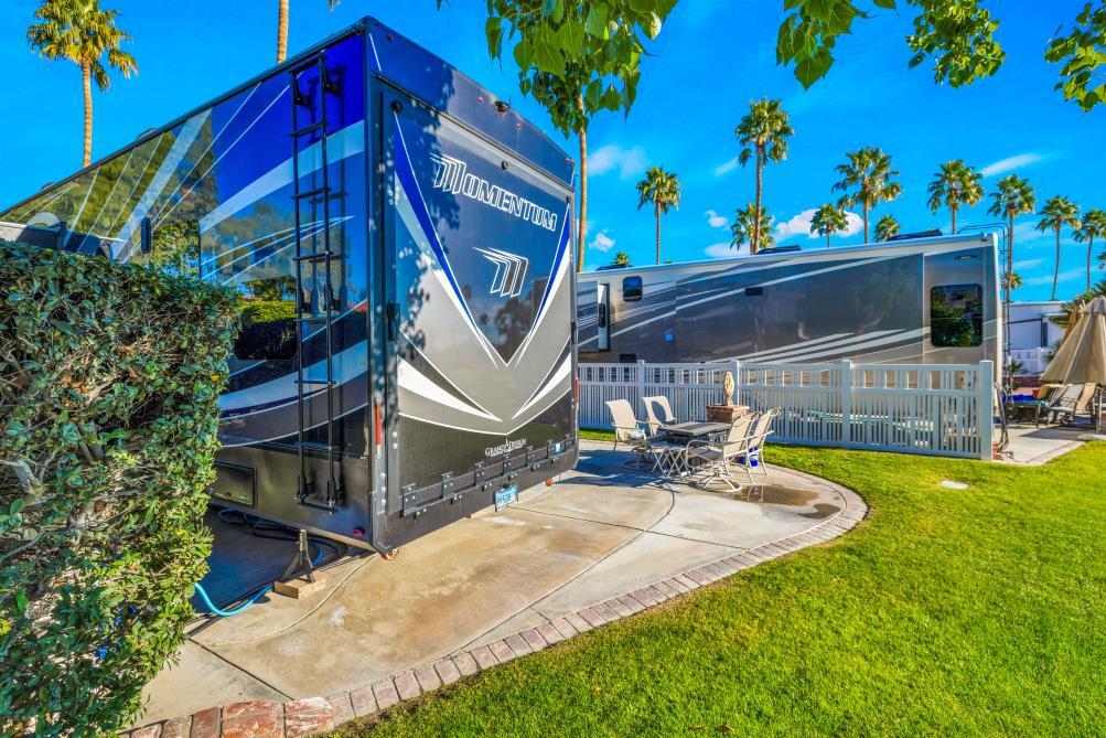 69411 Ramon Road, Unit 1158 Cathedral City, CA 92234 - Photo 15 of 18 a view of a chairs and table in the patio
