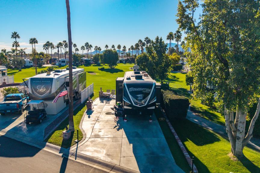 69411 Ramon Road, Unit 1158 Cathedral City, CA 92234 - Photo 17 of 18 a view of a swimming pool with lounge chairs