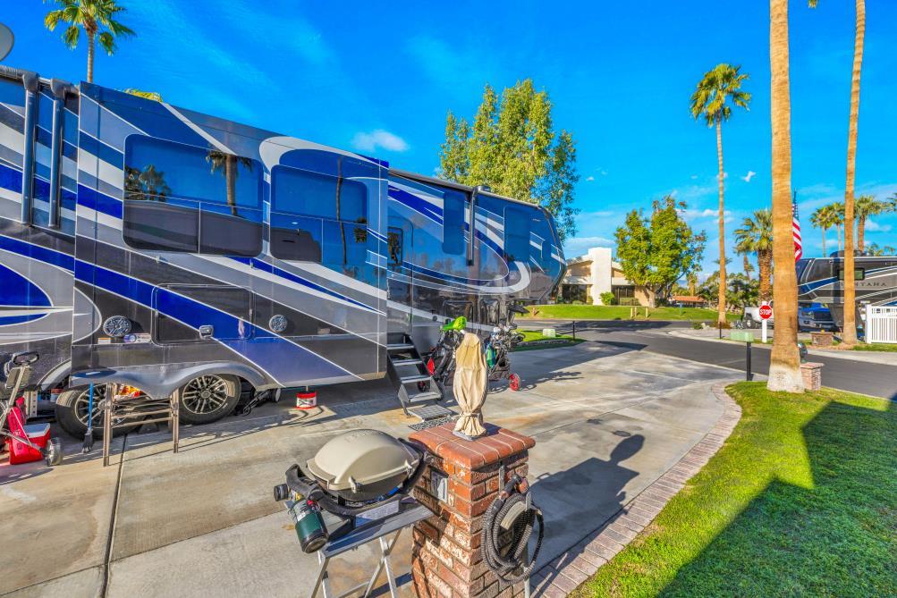 69411 Ramon Road, Unit 1158 Cathedral City, CA 92234 - Photo 8 of 18 a front view of a house with outdoor space