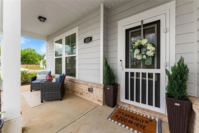 a view of a porch with furniture
