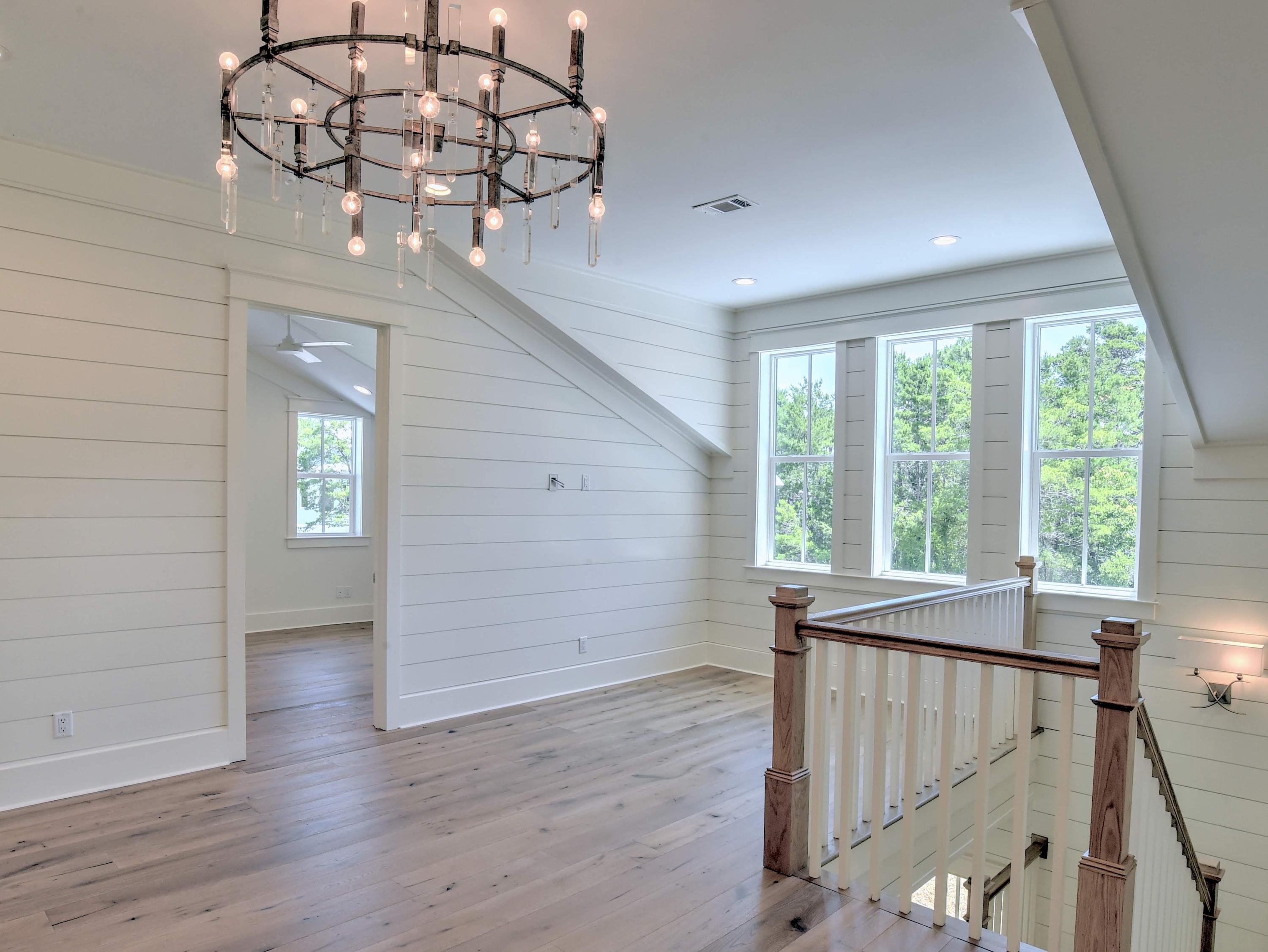 237 Cabana Trail Santa Rosa Beach, FL 32459 - Photo 14 of 27 wooden floor in an empty room with a window
