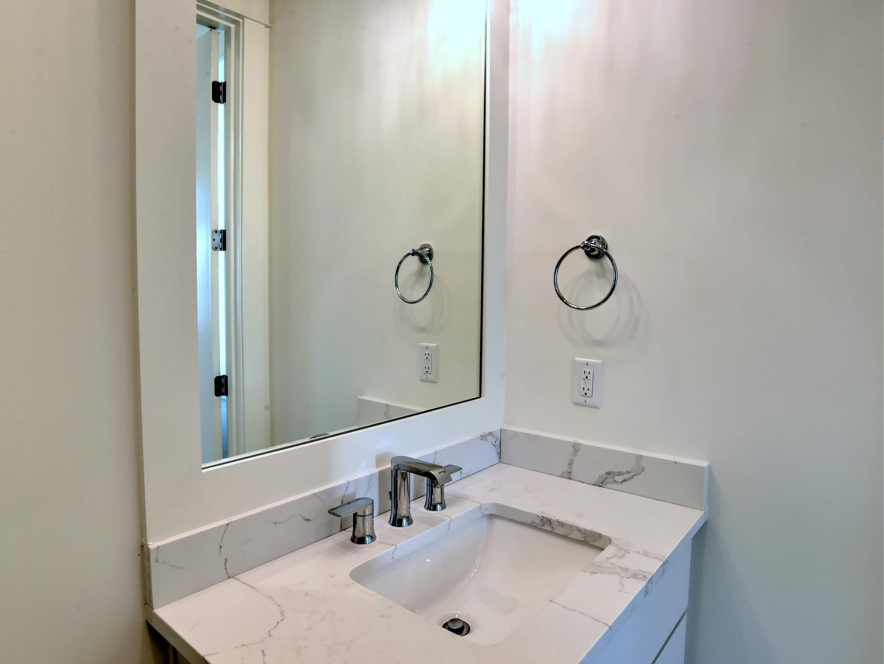 237 Cabana Trail Santa Rosa Beach, FL 32459 - Photo 15 of 27 a bathroom with a sink and a mirror