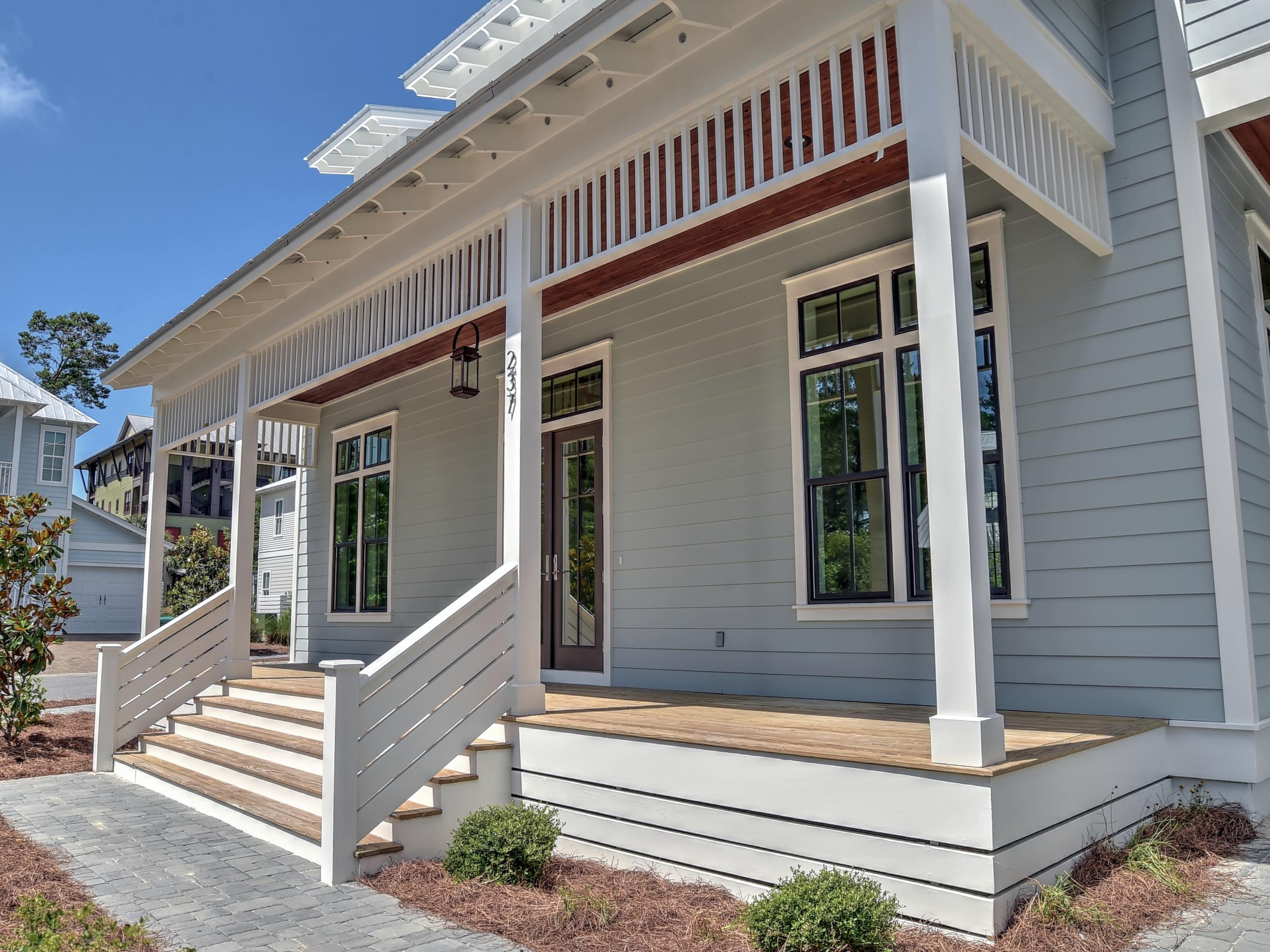 237 Cabana Trail Santa Rosa Beach, FL 32459 - Photo 3 of 27 a front view of a house with a porch