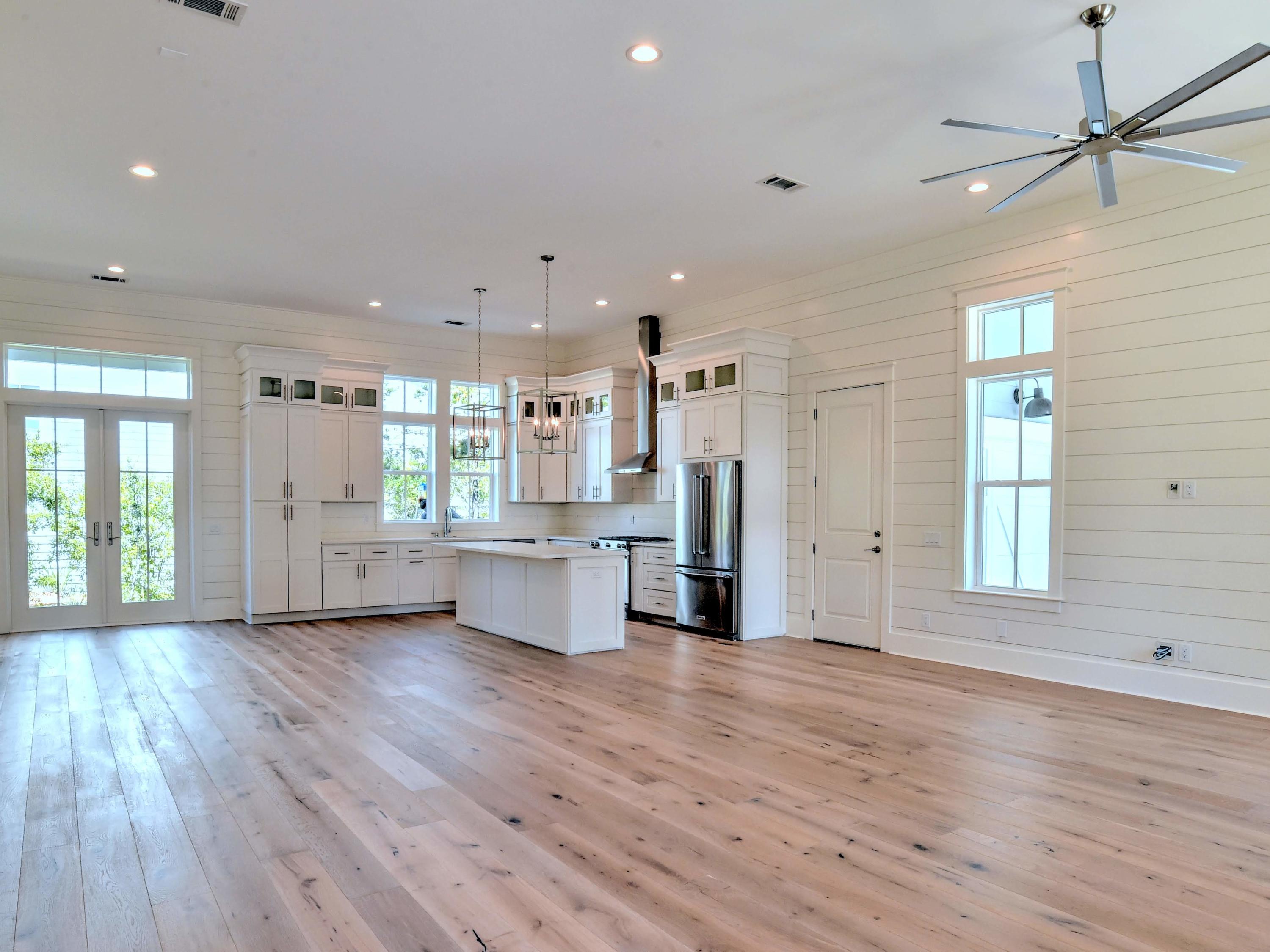 237 Cabana Trail Santa Rosa Beach, FL 32459 - Photo 5 of 27 a large space with a large window and wooden floor