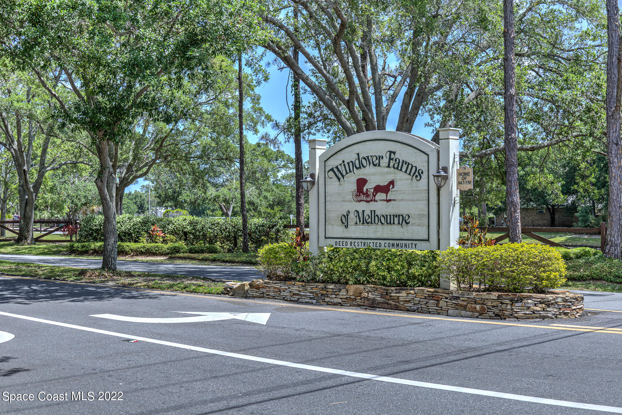 3415 Shady Run Road Melbourne, FL 32934 - Photo 34 of 45 a sign on the side of a road