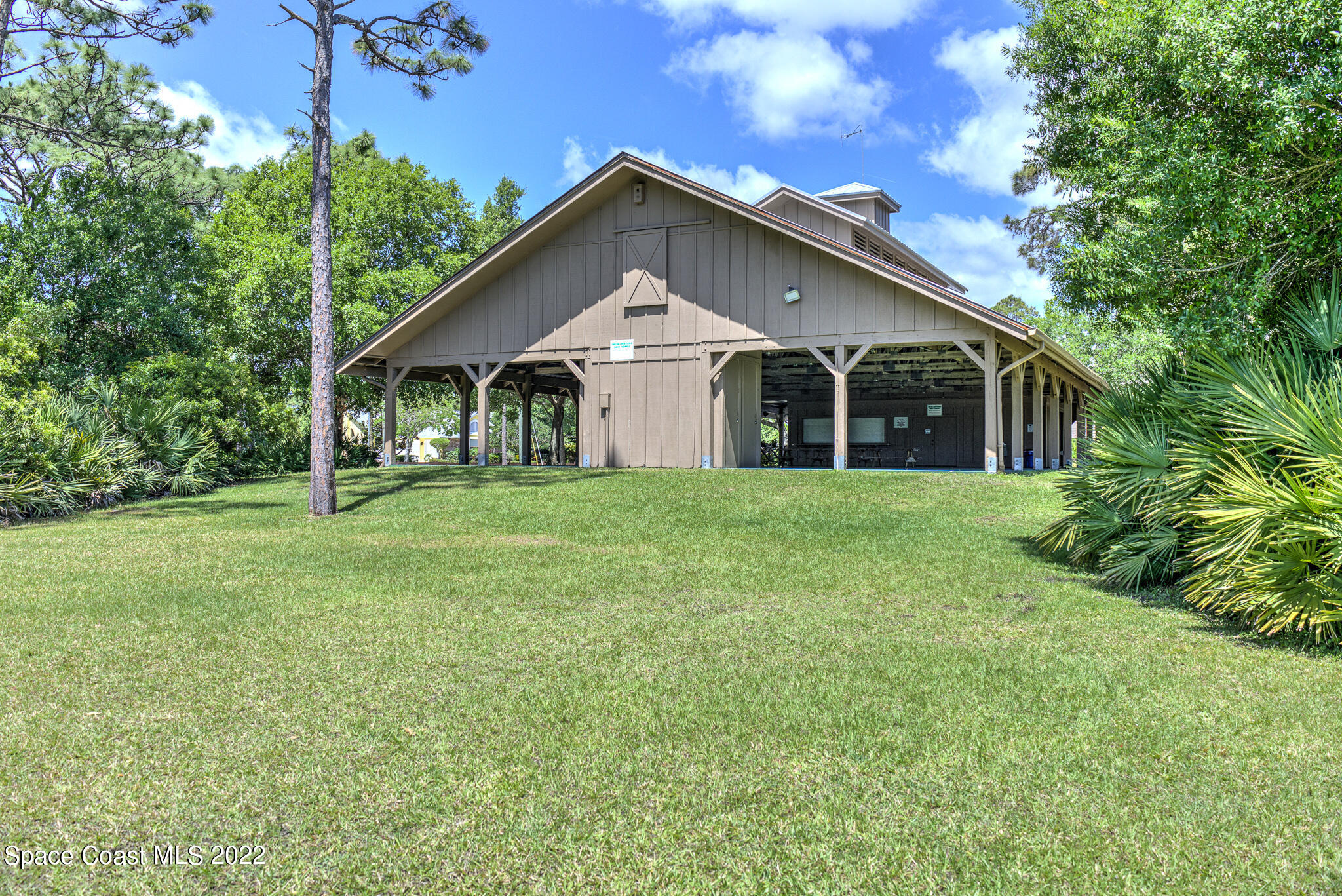3415 Shady Run Road Melbourne, FL 32934 - Photo 38 of 45 a front view of a house with garden