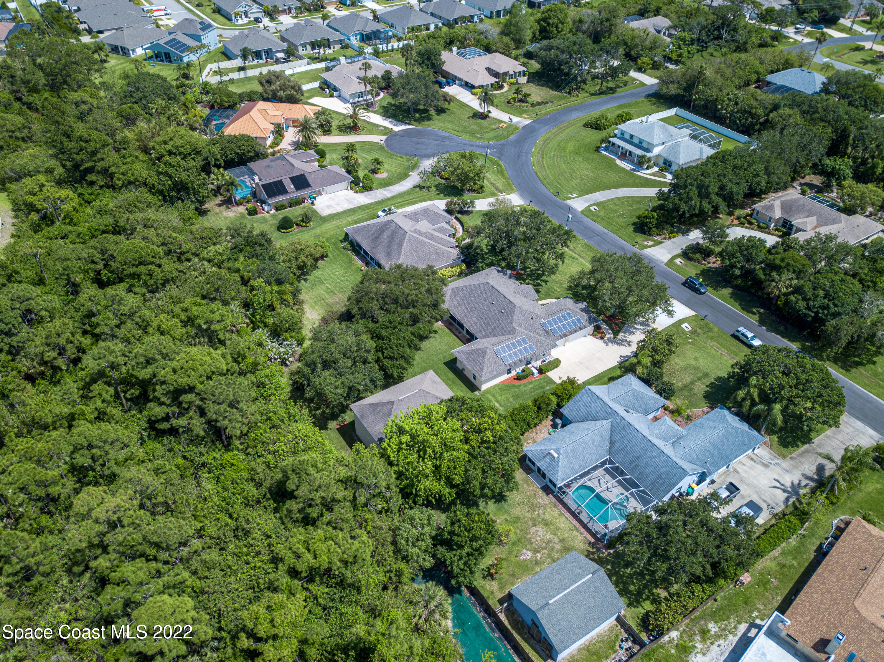 3415 Shady Run Road Melbourne, FL 32934 - Photo 45 of 45 an aerial view of residential houses with outdoor space and street view