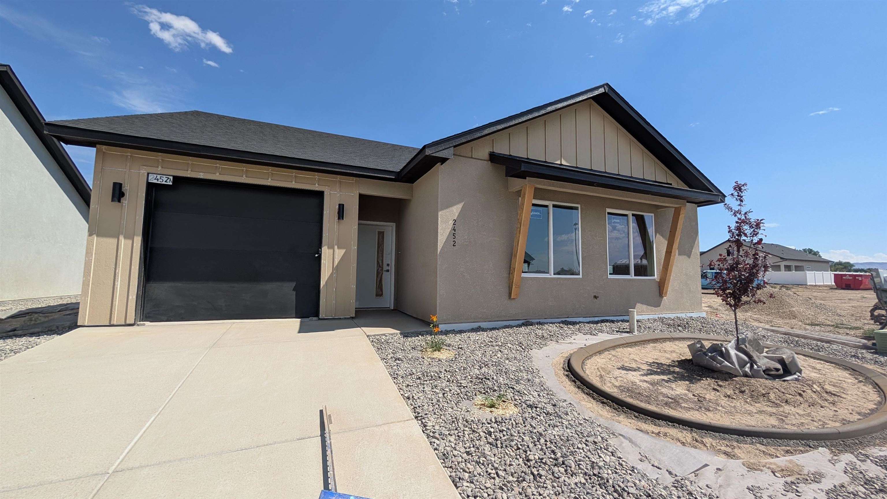 2452 Hamilton Road, Unit A Grand Junction, CO 81505 - Photo 1 of 13 a front view of a house with entertaining space