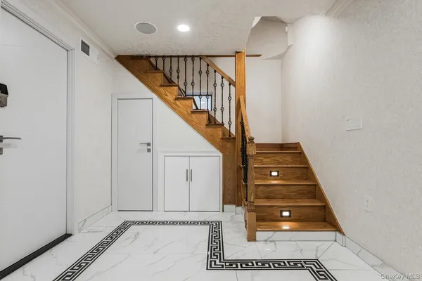 a view of a hallway with entryway