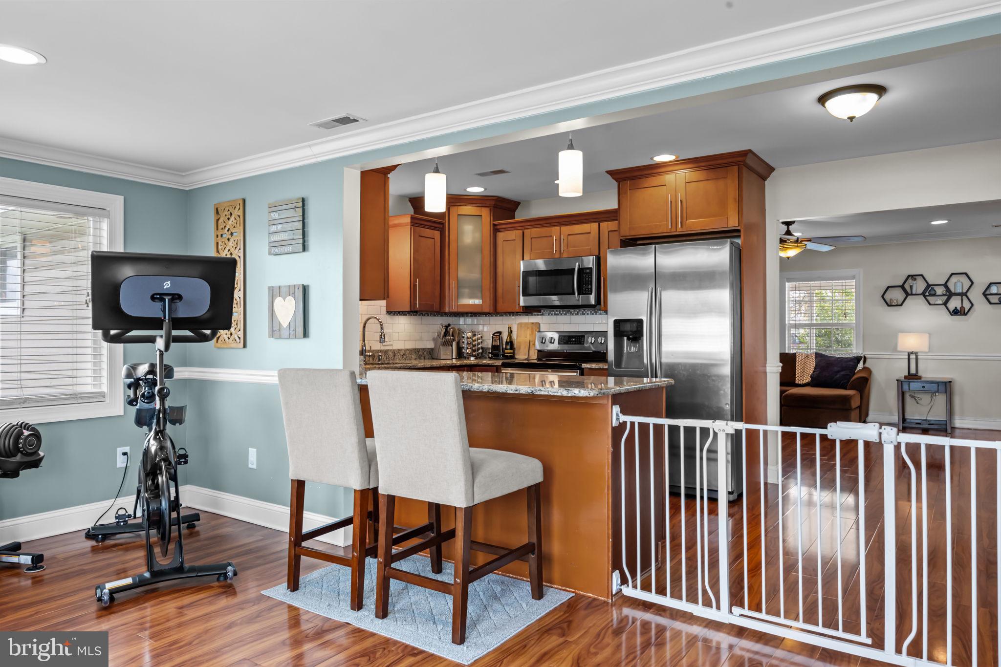 118 Plumtree Road Levittown, PA 19056 - Photo 9 of 39 Sunroom/ Kitchen view, Barstools Incld!