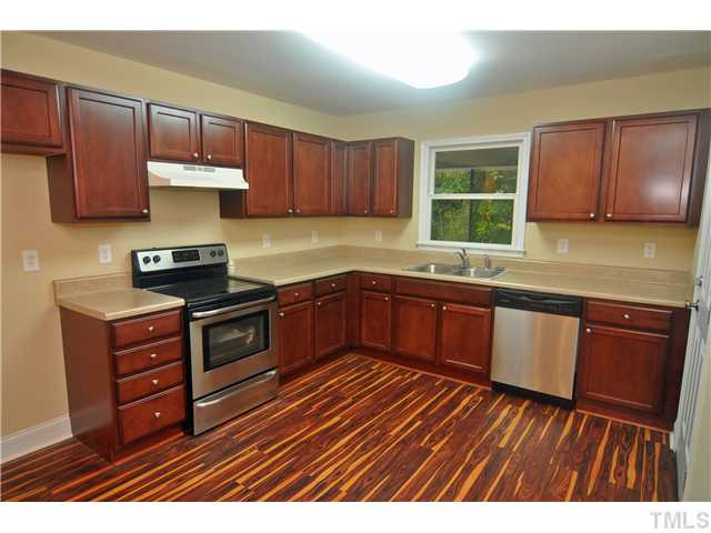 1706 Euclid Road Durham, NC 27713 - Photo 3 of 25 NEW Kitchen Cabinets/Countertop, NEW Stainless Steel Dishwasher and Smooth Top Electric Range. Kitchen