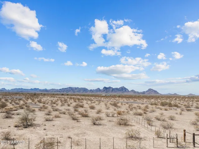 a view of a lake with a mountain in the background