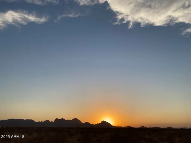 a view of house and mountains