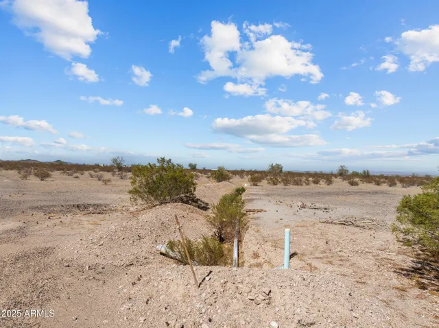 a view of a lake with beach and ocean