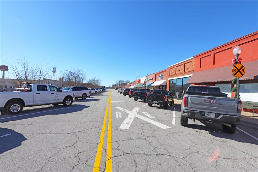 216 Main Street Bremen, GA 30110 - Photo 5 of 22 a view of parking with cars parked