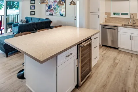 a bedroom with a bed and a cabinets