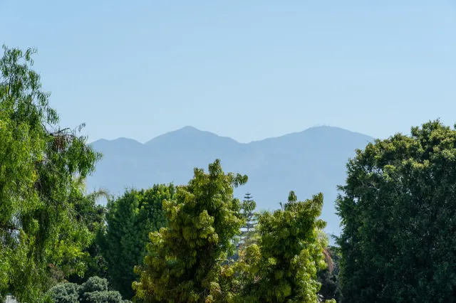 a view of a lake in front of a building