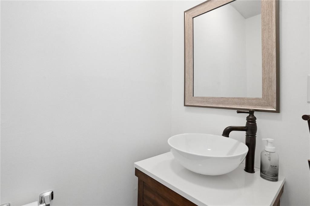 1430 Thomas Road Decatur, GA 30030 - Photo 28 of 42 a bathroom with a sink and a toilet