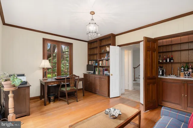 a view of a workspace with furniture and toys