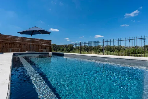 a view of swimming pool and lake view