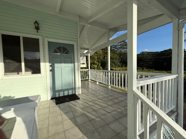 a view of a balcony with a flat screen tv
