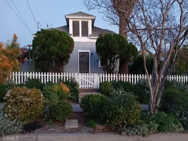 a house view with a garden space