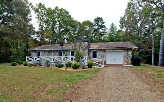 2644 River Hill Road Murphy, NC 28906 - Photo 1 of 1 a front view of a house with yard and trees